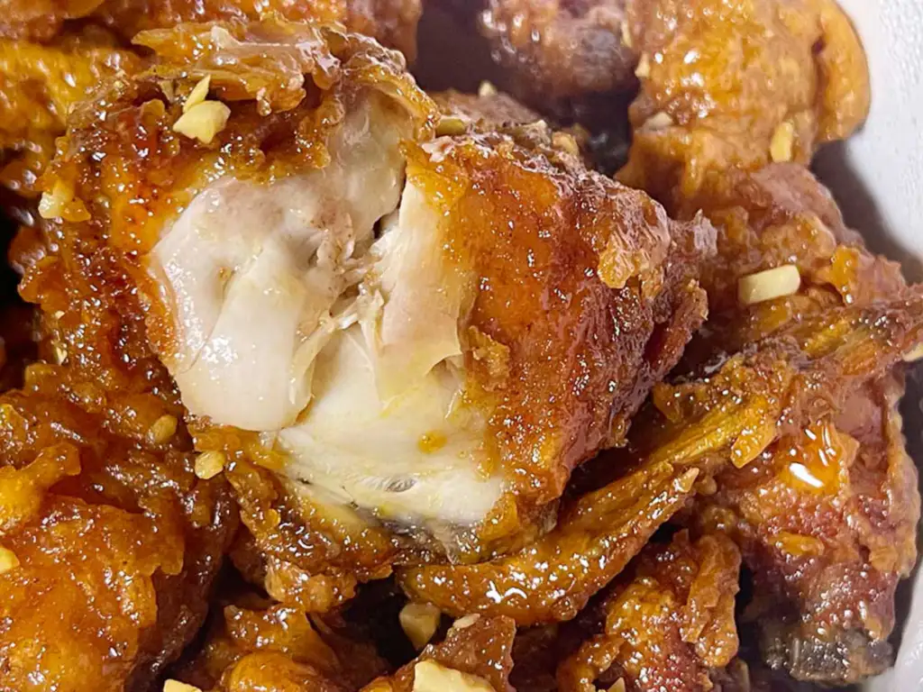 Shinpo Dakgangjeong fried food with the skin peeled off